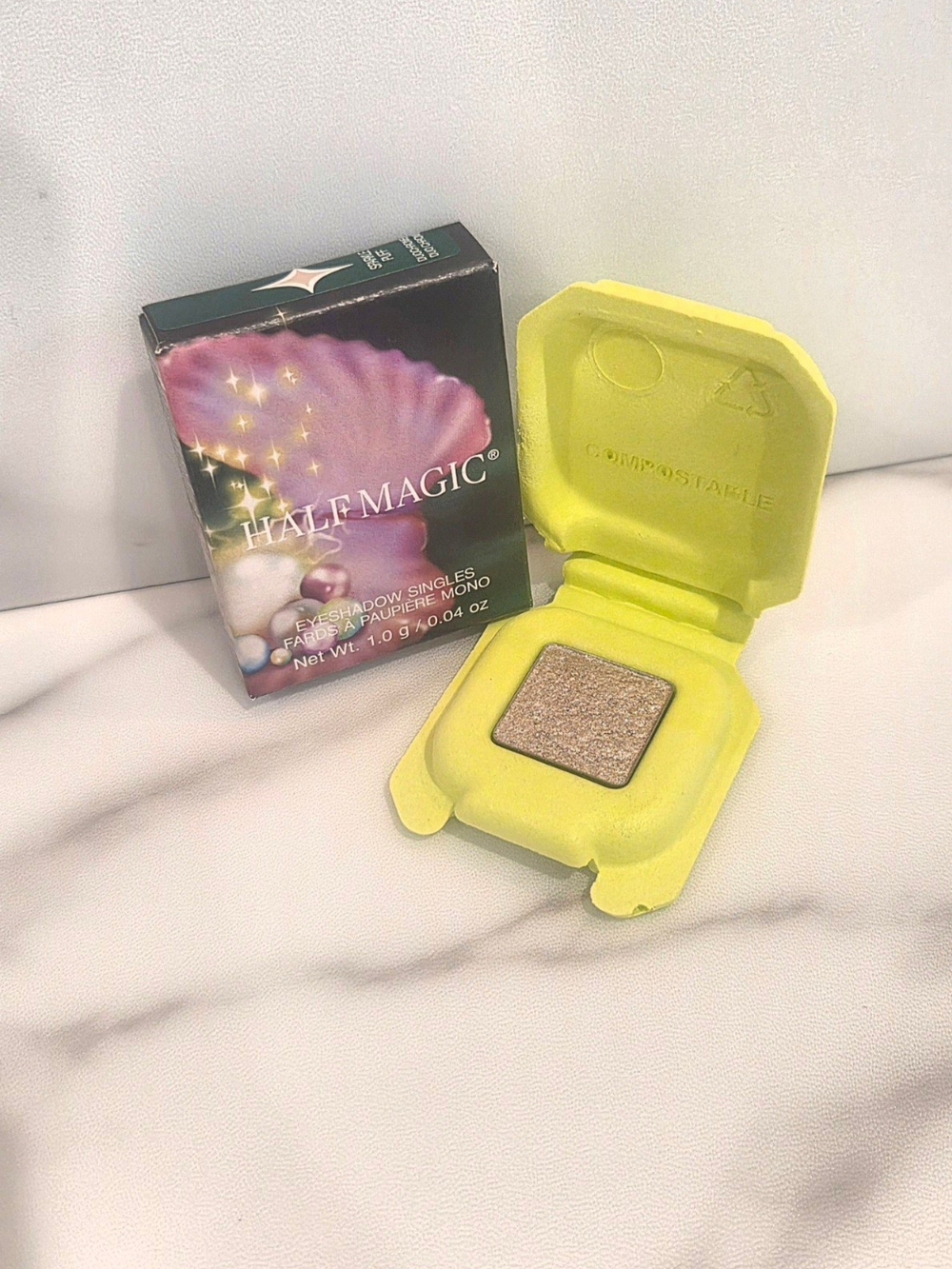 Half Magic Eyeshadow Singles In Sparkle Puff  (Champagne With Icy Blue Sparkle)